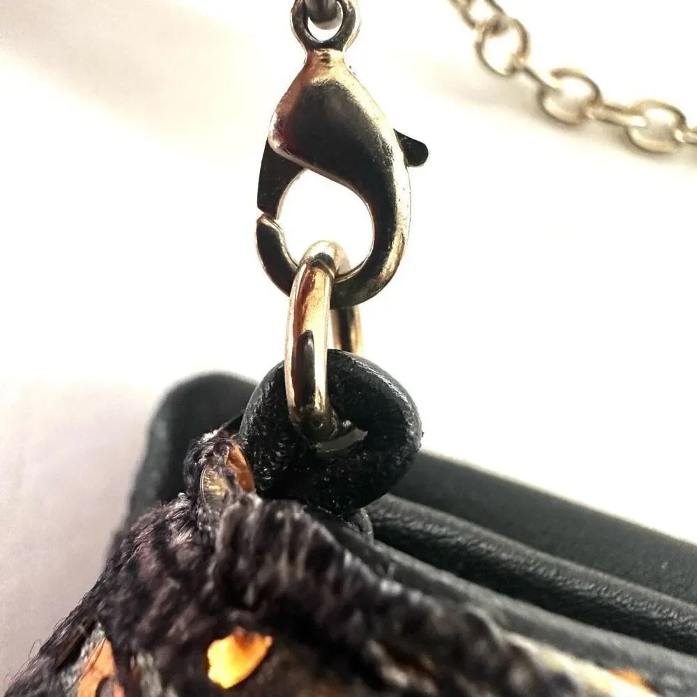 La Je  expandable clutch purse